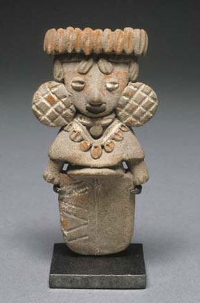 female_figurine_with_large_earspools_and_unified_lower_body